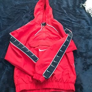 red nike wind breaker